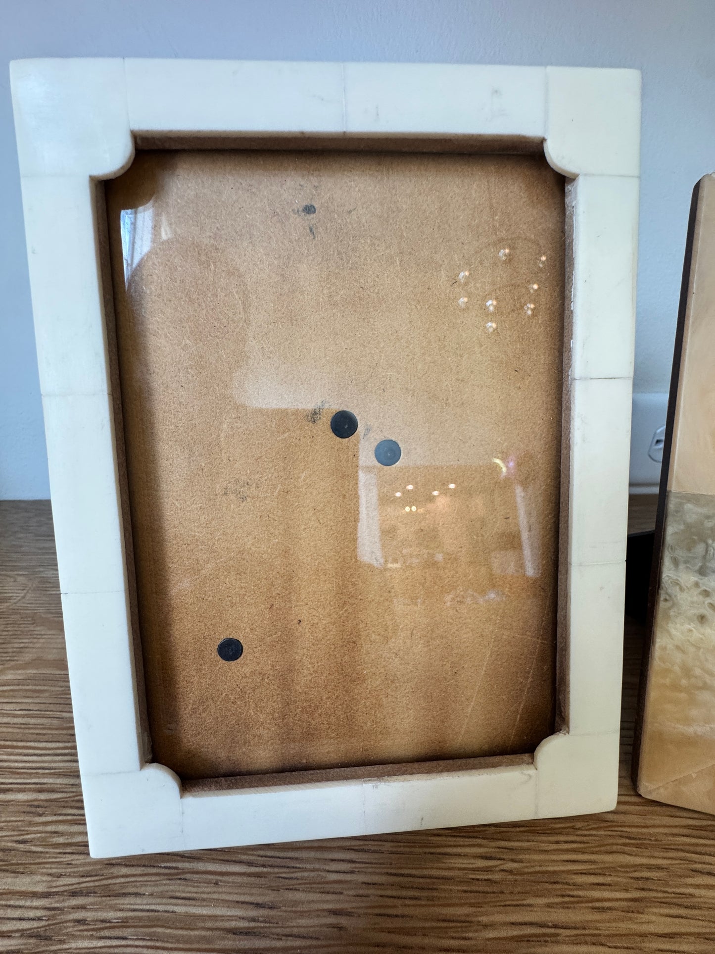 Two stylish stone photo frames