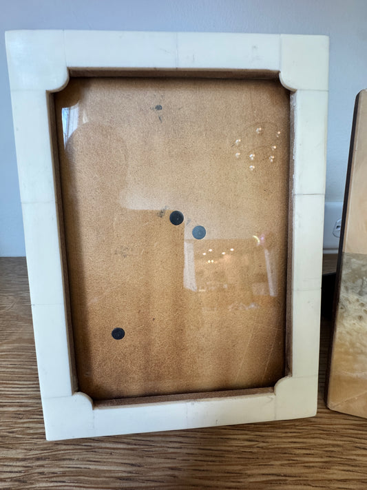 Two stylish stone photo frames