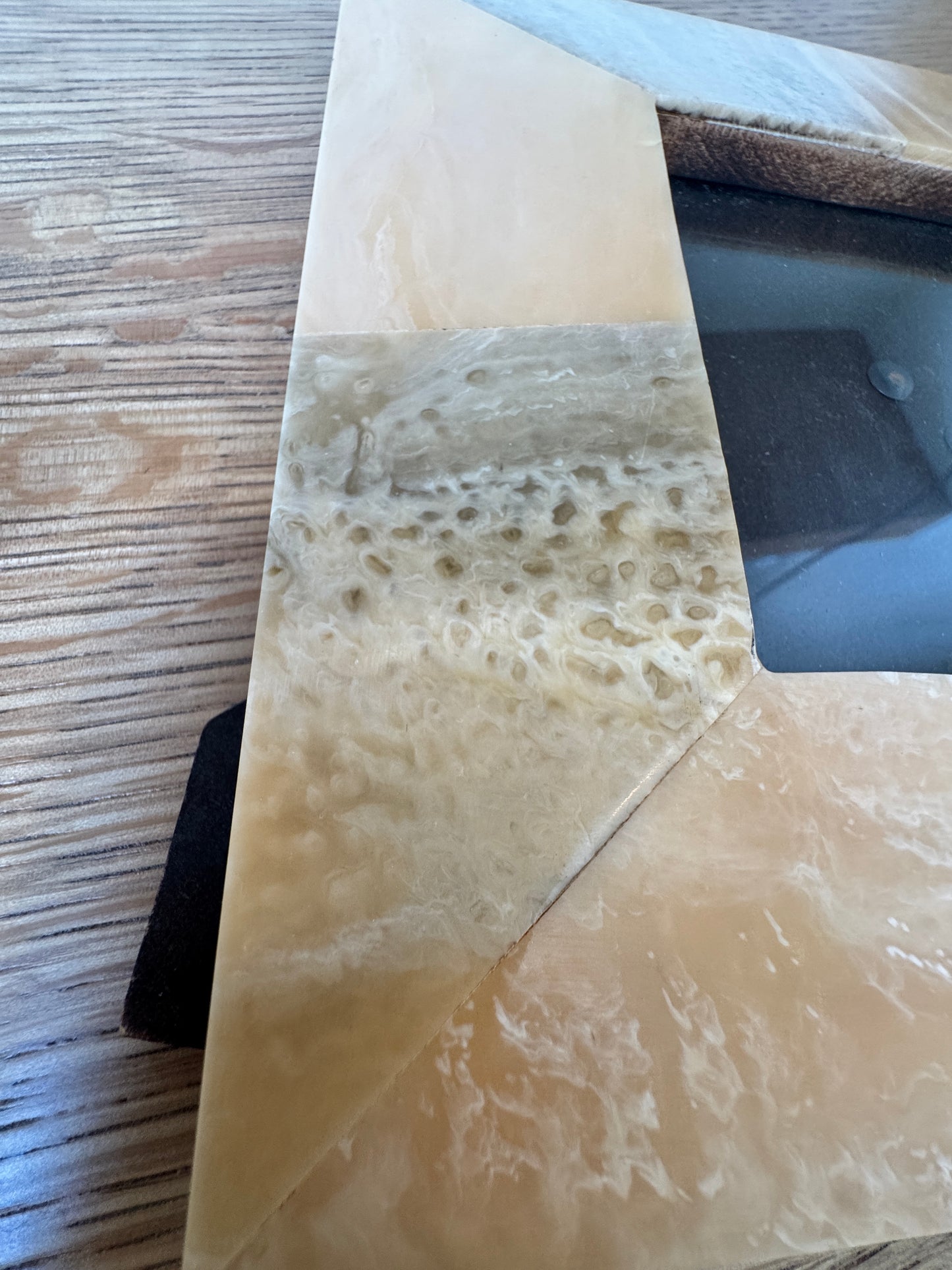 Two stylish stone photo frames
