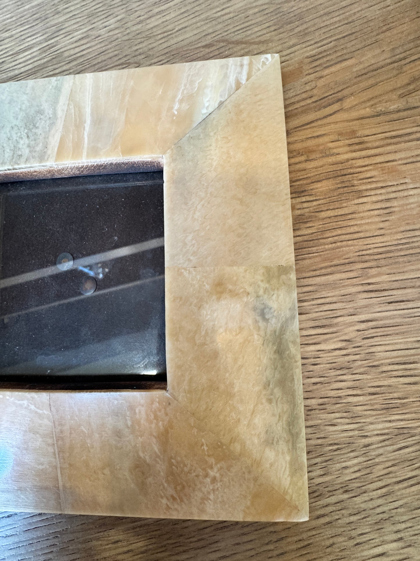 Two stylish stone photo frames