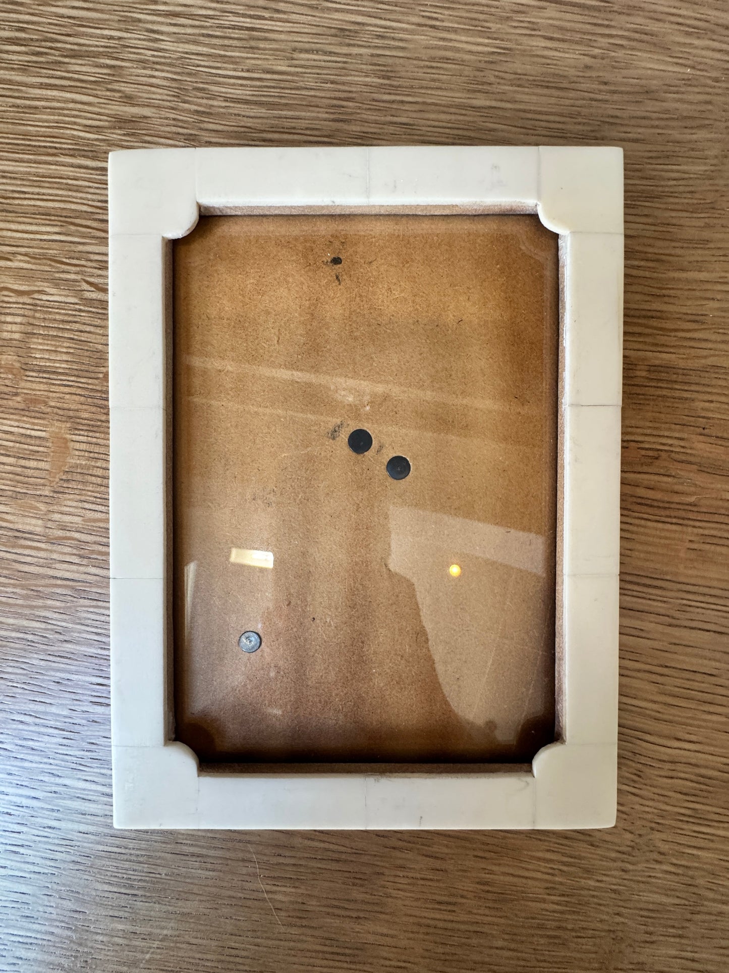 Two stylish stone photo frames