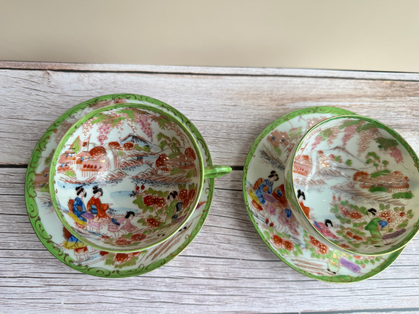 Vintage Japanese Scenic Teacups & Saucers – Pair with Gold Trim and Landscape Motifs