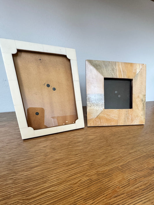 Two stylish stone photo frames