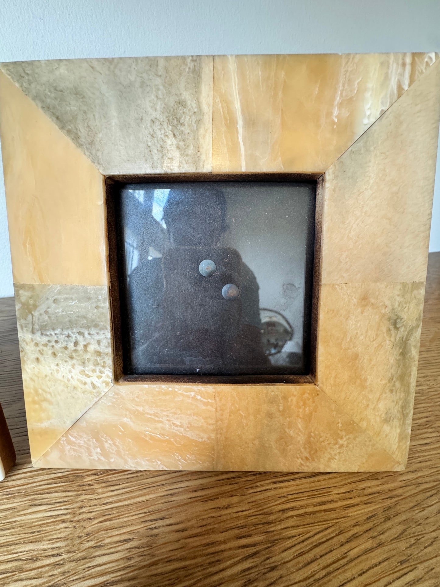 Two stylish stone photo frames