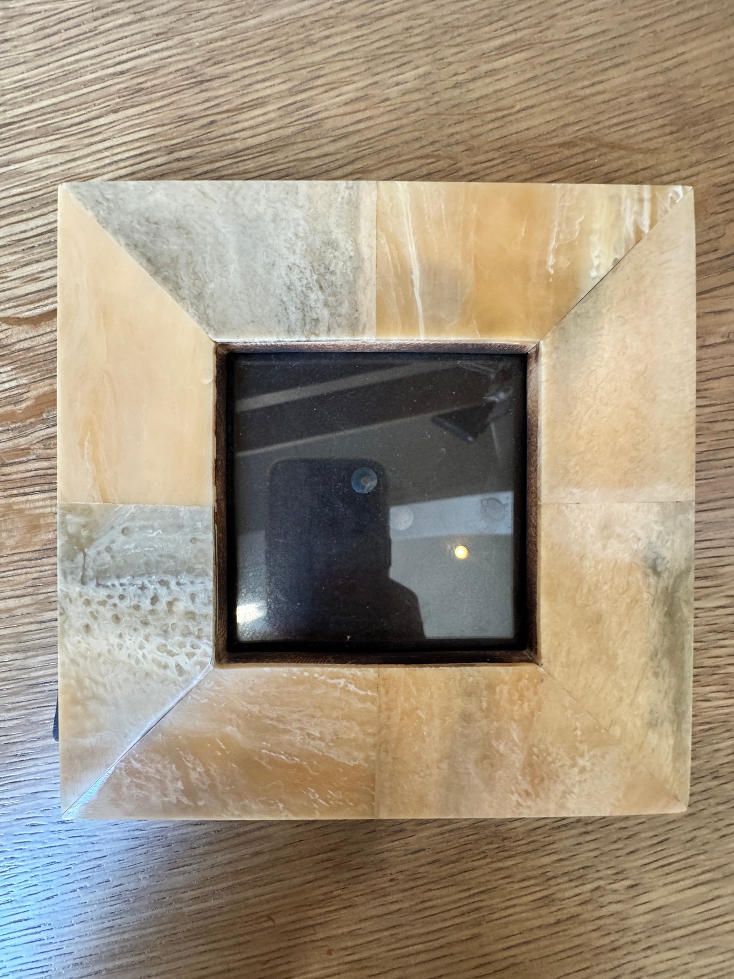 Two stylish stone photo frames