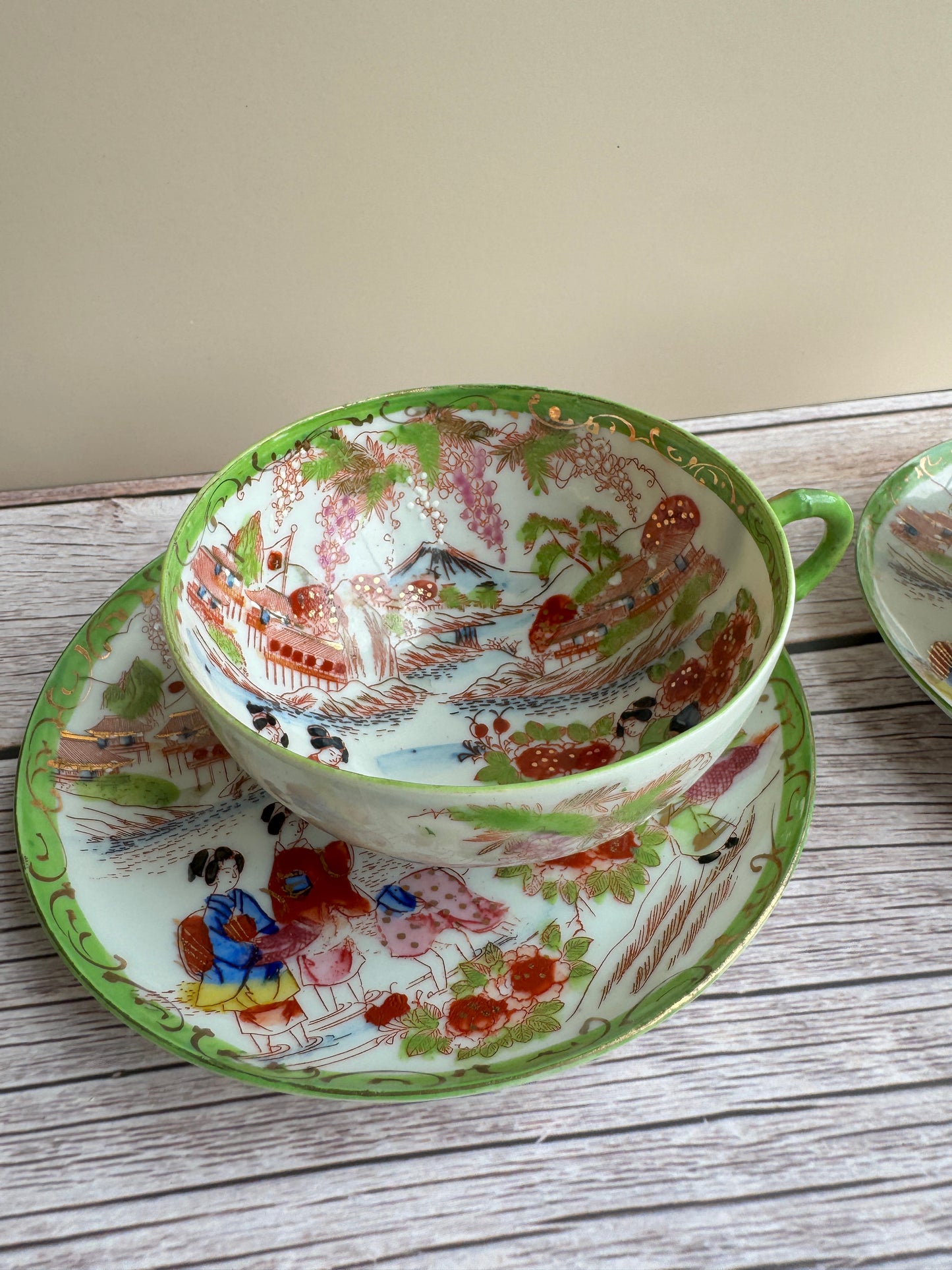 Vintage Japanese Scenic Teacups & Saucers – Pair with Gold Trim and Landscape Motifs